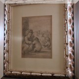 A13. Framed etching of child with dog. 12”h x 11”w 
